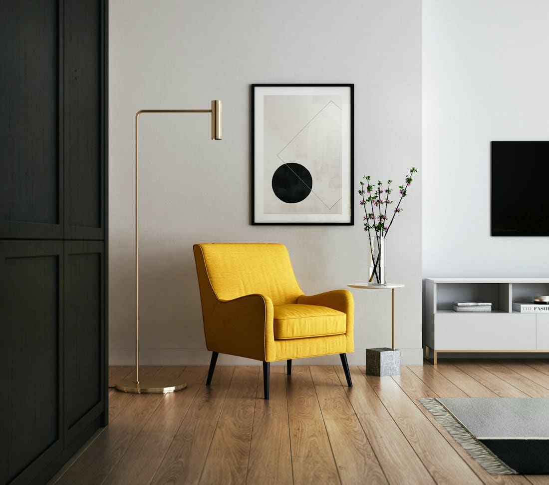 Minimal living room with a mustard armchair and floor lamp